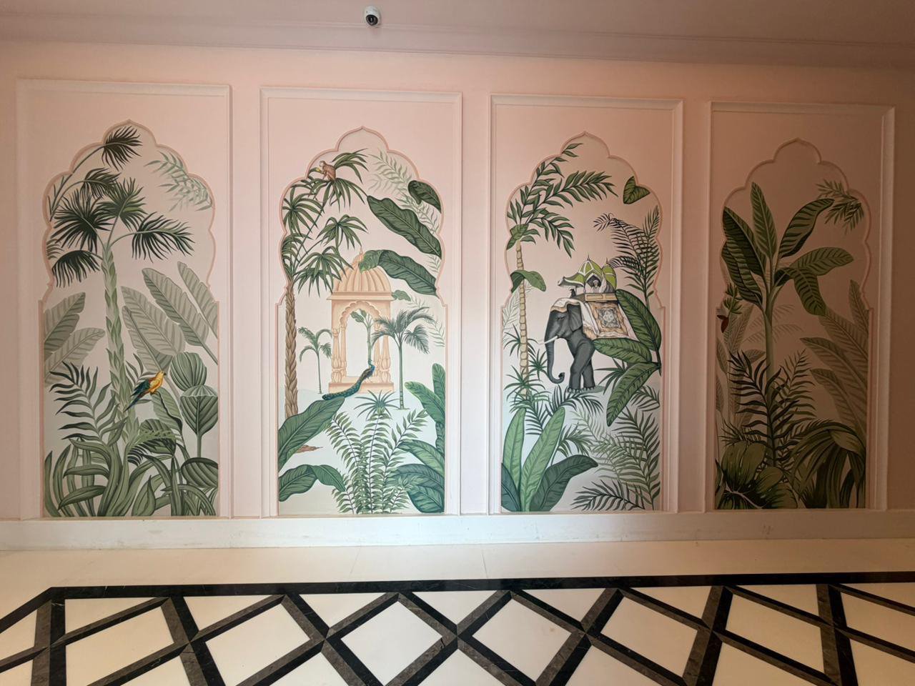 A hotel public space featuring work by The Artemist