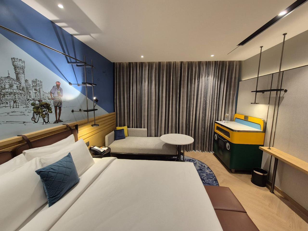 A hospitality space with artwork placed by The Artemist, Kolkata