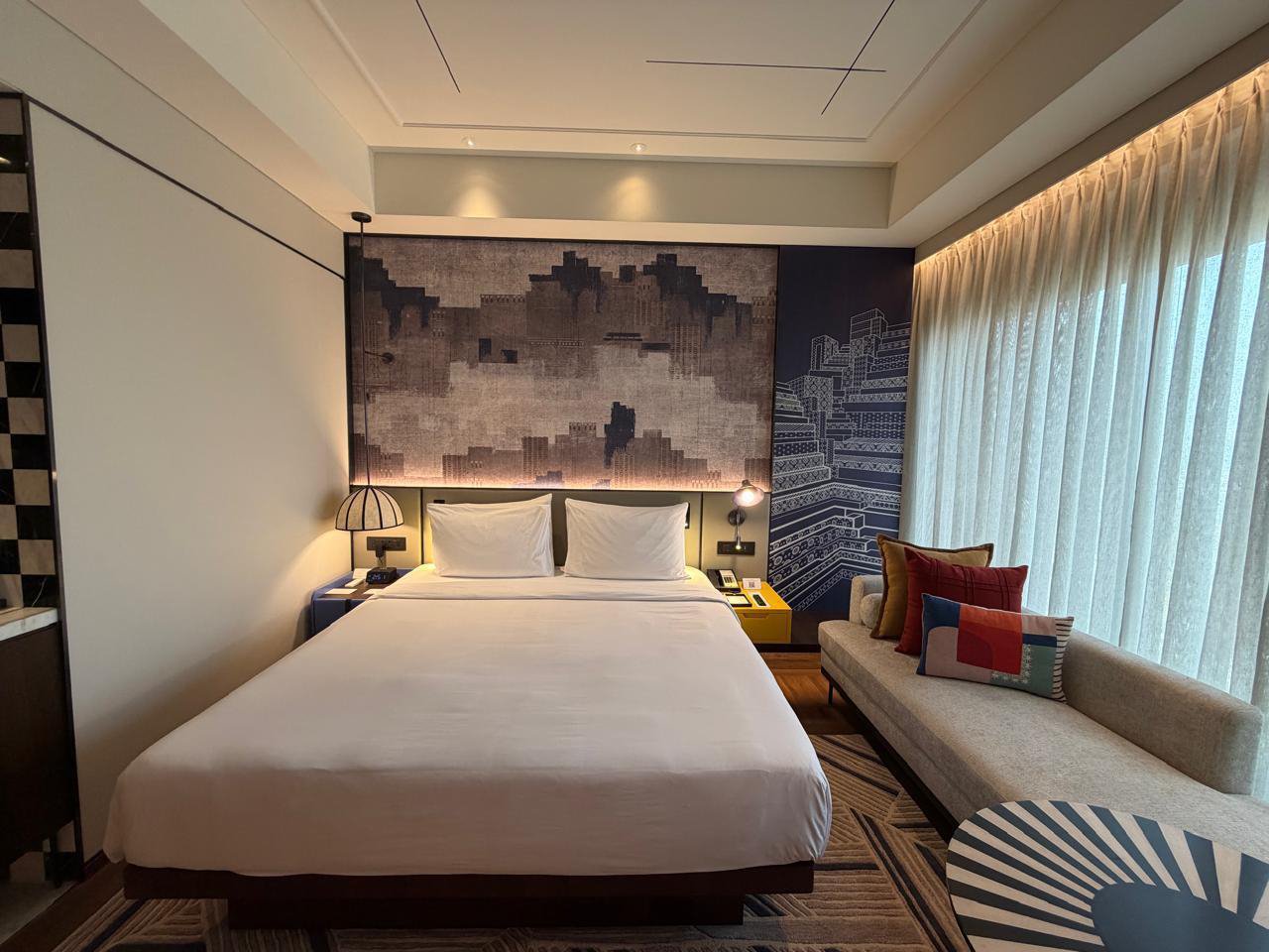 Commissioned wall art in a hotel guest area — The Artemist consultancy